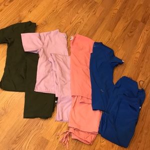 4 Sets of used scrubs